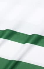 Official Sporting Lisbon 2025/26 home football jersey with green and white design.