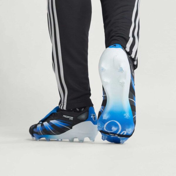High-performance Predator Elite JB firm ground football boots with dynamic design.