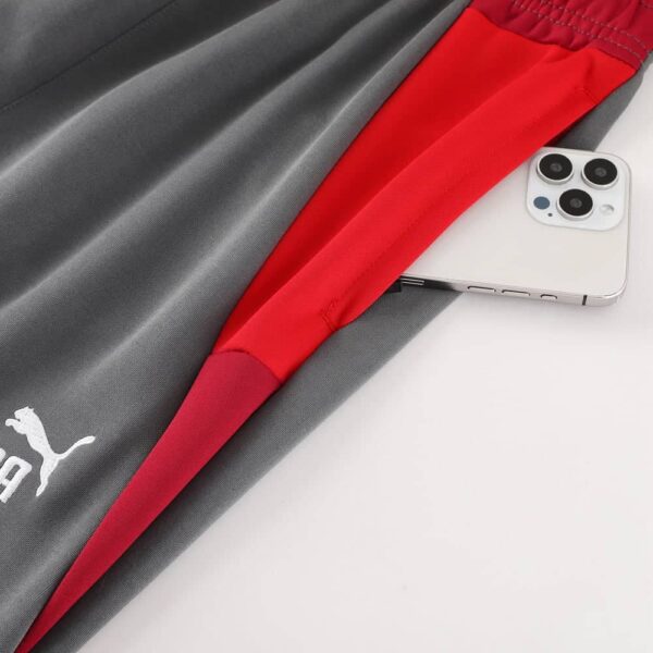 AC Milan official pre-match Jacetsuit for 2024/25 season, featuring team colors and logo.