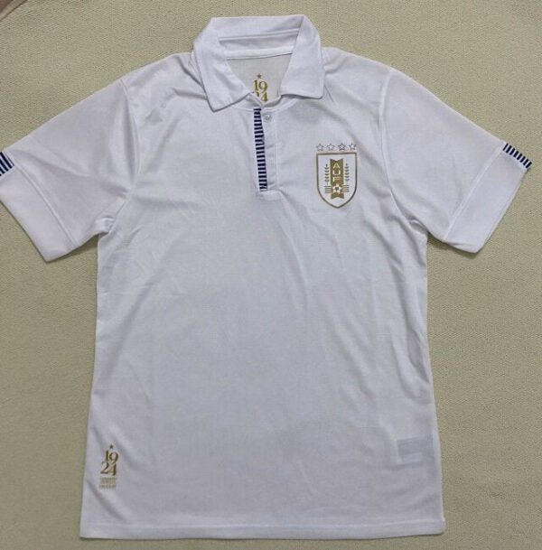 Official UAE national football team jersey, white with team crest and gold accents.