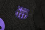 FCB Barcelona black tracksuit with club crest for 2025/26 season.
