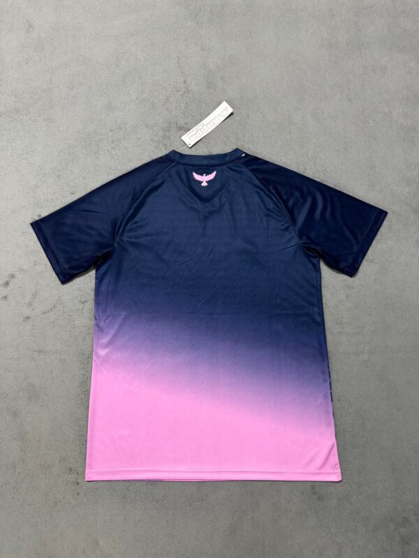Authentic navy and pink gradient football jersey for sports fans.