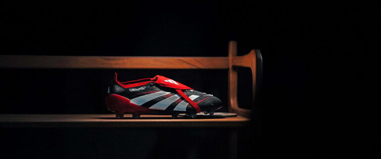 Predator Elite Fold-over Tongue SG football boots in core black, footwear white, and vivid red.