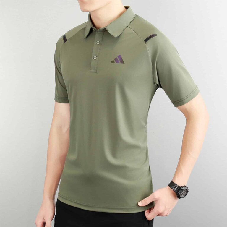 Adidas men's polo shirt in green with black accents, perfect for sports and casual wear.