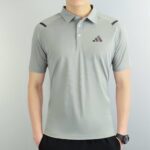 Men's Adidas polo shirt available in four stylish colors, perfect for sports, casual outings, and ac.