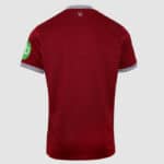 Red football jersey with white striped sleeves and green logo on the sleeve.