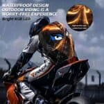 High-quality waterproof motorcycle helmet with LED lights and printed hard case.