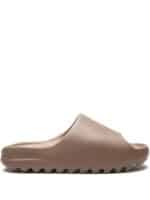 Beige slide sandal with Nike Off-White branding, casual footwear for men and women.
