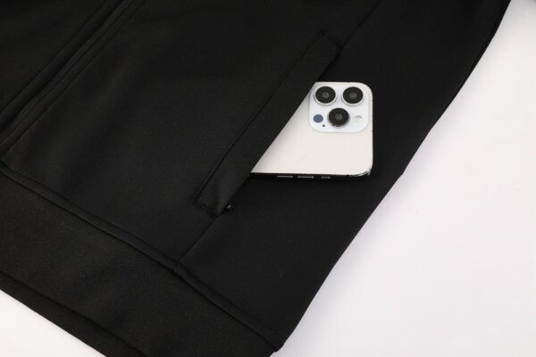 High-quality Nike Dri-fit jacket in black and white for athletes and sports enthusiasts.