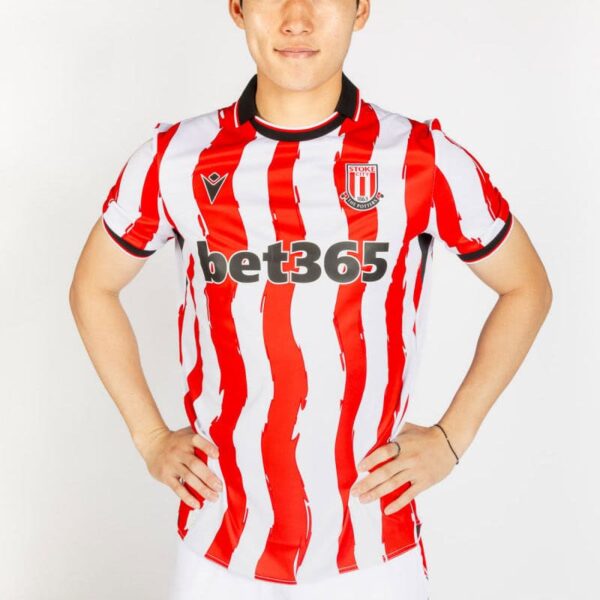 Stoke City 2025/26 home football jersey with red and white vertical stripes, featuring Bet365 sponso.