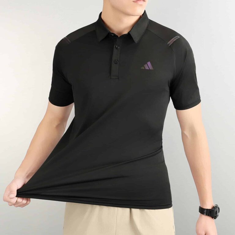 Black Adidas men's polo shirt with subtle logo and sporty design, perfect for casual or athletic wea.