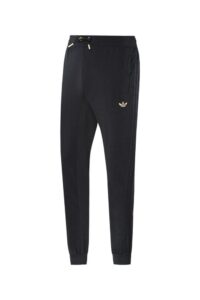Black Adidas joggers with gold logo, comfortable sportswear for men.