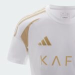 AL Nassr third football jersey 2024/25 featuring Ronaldo, white and gold design.