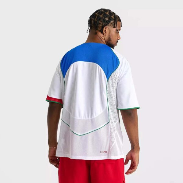 Nike Total 90 men's soccer jersey in white with blue accents.