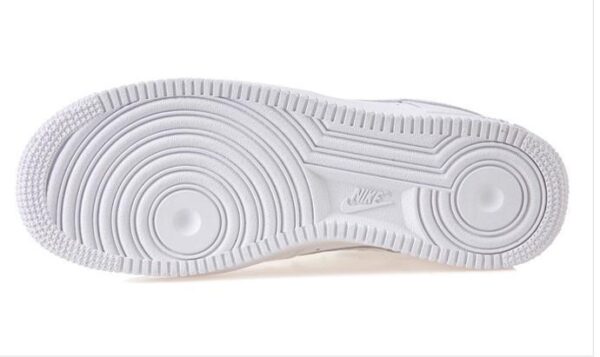 White Nike Air Force Low 1 sneaker sole for men and women.