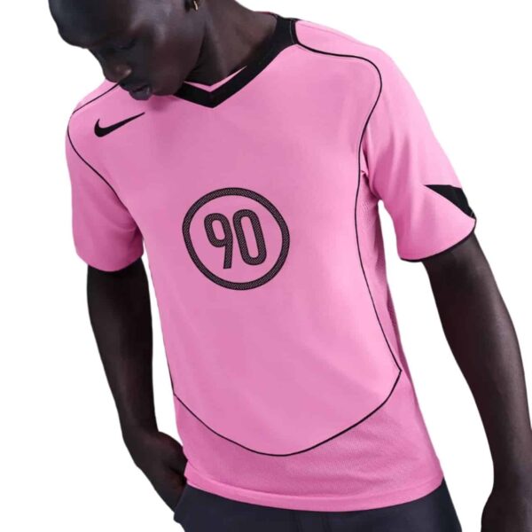 Pink Nike Total 90 soccer jersey for men with black accents and number 90 logo.