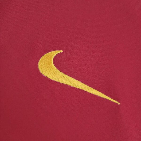 Nike Swoosh logo embroidered on Portugal 2022 Ronaldo World Cup Final football jersey.