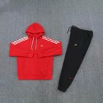 Adidas red hoodie and black joggers set, sportswear for active lifestyle.
