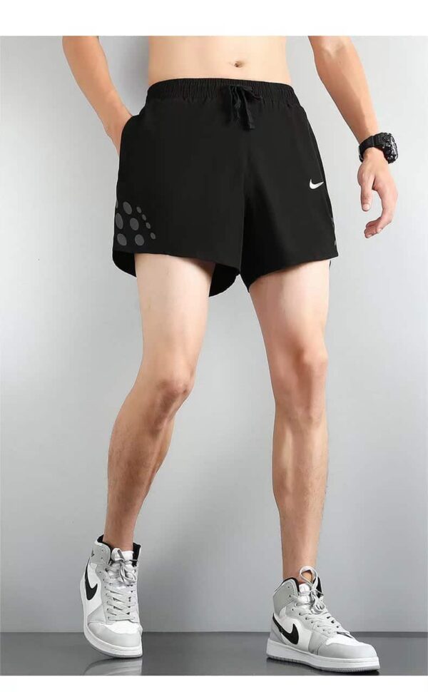 Nike Pro Dri-FIT athletic shorts for men, black with gray accents, lightweight and moisture-wicking.