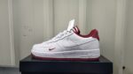 Nike Air Force Low 1 sneakers in white and red for men and women.