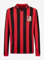 Authentic football jersey with red and black vertical stripes, featuring team badge on chest.