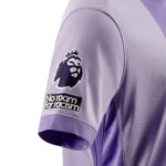 Brighton football jersey with Premier League logo and anti-racism message.