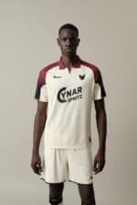Men's football jersey and shorts, white with maroon detailing, perfect for sports.