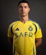 AL Nassr home jersey 24/25 with Ronaldo 7, yellow and blue, front view.