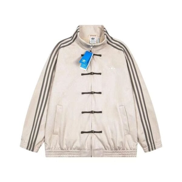 Unisex beige adidas casual jacket with traditional Chinese toggle closures and iconic three-stripe d.