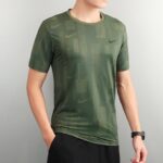 Men's Nike sports shirt in four color options.