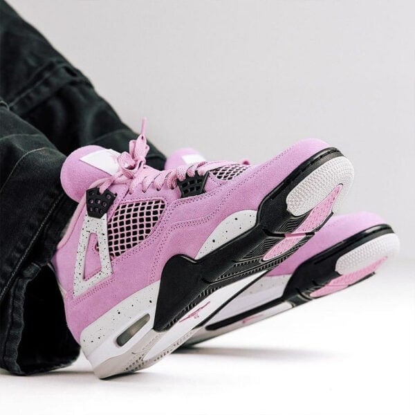 Air Jordan 4 Orchid - Authentic pink and black basketball shoes for sports and casual wear.