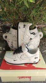 Air Force Low 1 07 White Black sneakers, stylish athletic footwear for men.