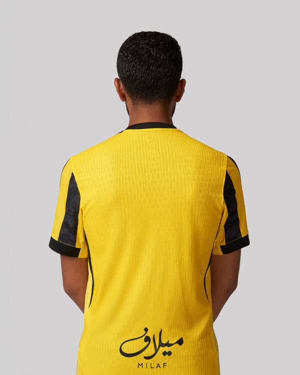 Al-Ittihad football jersey for home games, 2025/26 season, yellow with black accents.