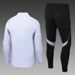 White Adidas sports tracksuit with black and gray accents, ideal for training and casual wear.