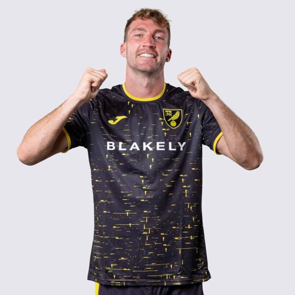 Norwich City away football jersey 2024/25 with team logo and modern design.