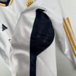 Athletic football jersey featuring black shoulder patch and gold detailing, ideal for sports fans.