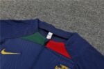 Training suit with Portugal national team logo and Nike branding, perfect for fans and athletes.