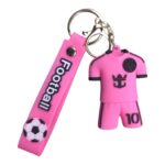 Mini football jersey keychain with pink design, football logo, and number 10, perfect for soccer fan.