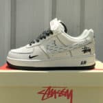 Air Force Low 1 07 White Black sneaker with black accents and branding.