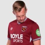West Ham United home football jersey with sponsor logo.