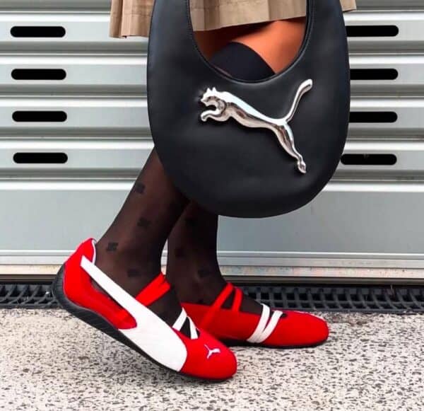 Puma Speedcat shoes with red and white design, stylish and comfortable for sports and casual wear.