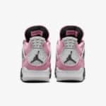 Back view of pink and white Air Jordan 4 Orchid sneakers for women.