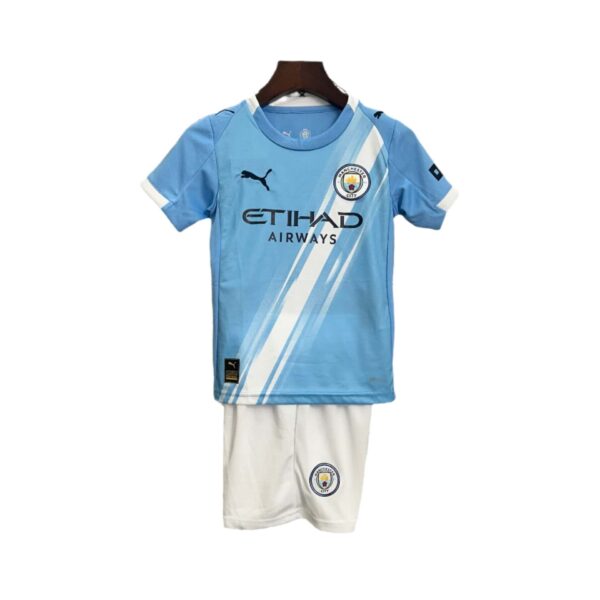 Kids Manchester City home football kit 2025/26 with jersey and shorts.