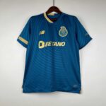 High-quality Porto away football jersey for 2023/24 season, featuring team logo and stylish design.