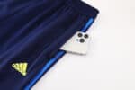 Boca Juniors football jacket with blue and yellow Adidas logo, perfect for fans and players.