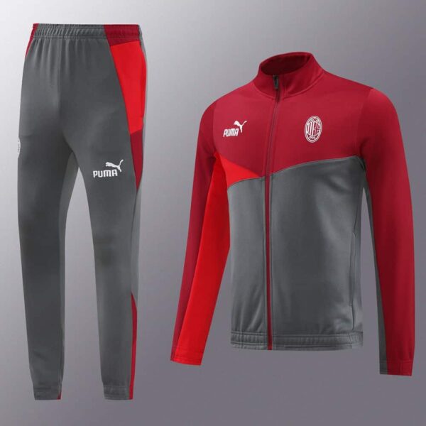 Official AC Milan pre-match tracksuit with Puma branding, red and gray design.