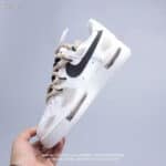 Nike Air Force Low 1 in white with beige accents, stylish casual sneakers for men.