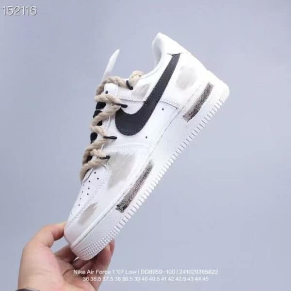 Nike Air Force Low 1 in white with beige accents, stylish casual sneakers for men.