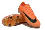 Nike Jr. Mercurial Vapor 16 Pro soccer cleats in vibrant orange with black swoosh.