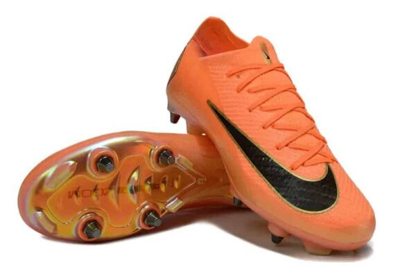 Nike Jr. Mercurial Vapor 16 Pro soccer cleats in vibrant orange with black swoosh.